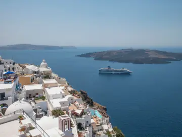 White buildings above a blue island bay